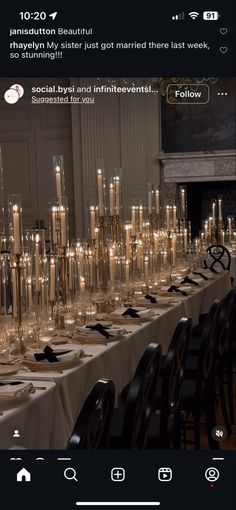 a long table with many candles on it