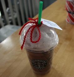 a starbucks drink with red string wrapped around it's cap and the caption says, ask barista for a clean cup and lid