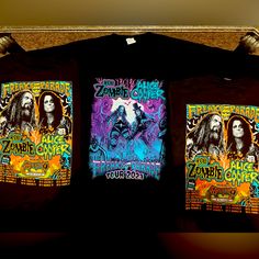 Freaks On Parade 2023 Tour Co-Headlined By Rob Zombie & Alice Cooper Official Tour Merch T-Shirts. All Shirts Are Pre-Washed,Pre-Shrunk On A 100% Cotton T-Shirt, Graphics Layered On With A 7-Color Digital Processor. Will Not Bleed Out In Wash, Will Stay True To Size. $50 @ The Show/Online, $30 Here. I Worked The Detroit,Mi. Show Black Shirt For Music Festival Fan Merchandise, Black T-shirt For Fall Music Festival, Black Graphic Print Shirt For Festival, Black Graphic Print Tops For Festivals, Black Rave T-shirt For Concert, Black Halloween Festival T-shirt, Detroit Rock City, Dark Blue Shirt, Tan T Shirt