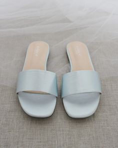 Classic slide flat sandals for casual and dressy look. Simple and easy wear for brides, bridesmaids and wedding parties.DETAILS:COLORS AVAILABLE: Ivory, Light Blue, White, Pink, and ChampagneUPPER: Synthetic upper and liningMATERIALS: Mandmade outsole STYLE NAME: EVELYN Bride Flat Sandals, Quinceanera Shoes, Bridesmaid Sandals, Shoes For Brides, Bridesmaids Shoes, Low Block Heel Sandal, Navy Blue Shoes, Pearl Sandals, Blue Wedding Shoes