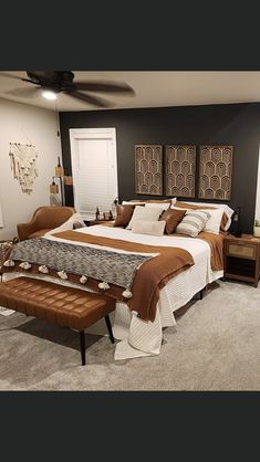 a bedroom with a large bed and two nightstands