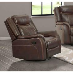 two brown recliners sitting in front of a window