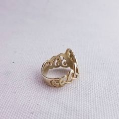 This vintage 10K gold Children of Lir ring is made by TJH of Ireland. The swan motif represents the transformation of the Children of Lir into swans. Size 5 1/4 Stamps: 10K Total Weight: 3.5g Width: 18mm face to 6mm band These pieces are pre-owned vintage jewelry. As this jewelry is not new there may be signs of wear or age. Each piece is sold as-is unless otherwise specified (ex. sizing). We strive to only sell vintage jewelry that is in good wearable condition. As with any jewelry, care and pr Vintage Adjustable Initial Ring, Art Nouveau 14k Gold Rings As Gift, 14k Gold Art Nouveau Rings As Gifts, Handmade Gold Oval Filigree Ring, Art Nouveau 14k Gold Jewelry For Anniversary, Gold Art Nouveau Ring For Formal Occasion, 14k Gold Art Nouveau Ring Jewelry, 14k Gold Art Nouveau Jewelry For Anniversary, 14k Gold Art Nouveau Round Ring