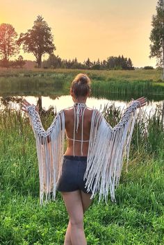 This glowing white color macrame top plus wings (separate) will be the best choice for your wild style photoshoot outfit. You can wear only this pearl luster color macrame top (without wings). This boho style macrame top with neck accessories will be perfect for your vacation luxury look outfit or beach outfit. It also will be suitable for your festival outfit.  Suitable for B/C sizes breast.  YOU CAN CONTACT ME FOR DIFFERENT COLORS, SIZES AND SPECIAL DESINGS. This item is made of polyester rope Macrame Top Outfit, Crochet Festival Outfit, Macrame Wings, Wings Macrame, Macrame Outfit, Macrame Wedding Dress, Macrame Dresses, Color Macrame, Macrame Top