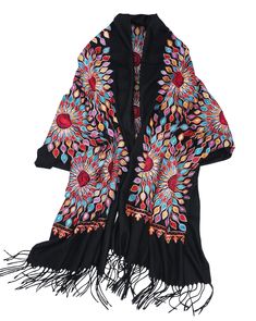 a black shawl with colorful flowers and fringes