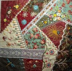 a close up of many different colored pieces of cloth with flowers and lace on them