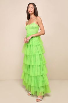 Treat any event like your own personal fashion show when you're wearing a show-stopping look like the Lulus Rule the Runway Lime Green Tulle Bustier Tiered Maxi Dress! This stunning dress is composed of sheer mesh tulle (atop a stretch knit lining) that shapes an alluring bustier-inspired bodice with seamed cups and supportive boning, a sweetheart neckline, and adjustable spaghetti straps. The high, fitted waist tops an A-line maxi skirt, adorned with fluffy tiers of tulle that are sure to make Glamorous Overbust Dresses For Gala, Fitted Tulle Cocktail Gown, Fitted Tulle Evening Gown, Fitted Tulle Gown For Evening, Overbust Gown For Prom Season Party, Overbust Evening Dress For Prom Season, Evening Tulle Gown With Fitted Design, Cocktail Tulle Gown Fitted, Overbust Gown For Prom Season