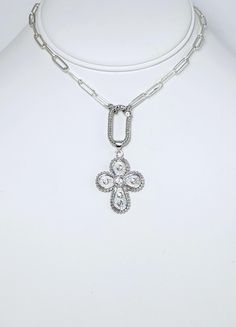 -Silver Stainless Steel Chain is 16" with a 2" extender chain and lobster claw closure. Paperclip chain links are 11x4mm -Silver Plated Brass and Cubic Zirconia Cross is 34x25mm -Oval Carabiner Spring Clasp Is Stainless Steel and is 4522x12.5mm Silver Charm Necklaces With Adjustable Oval Link Chain, Silver Paperclip Chain Pendant Necklace, Silver Dangle Necklace With Paperclip Chain, Silver Pendant Necklace With Paperclip Chain, Silver Necklace With Paperclip Chain Pendant, Silver Metal Charm Necklaces With Paperclip Chain, Silver Metal Charm Necklace With Paperclip Chain, Silver Paperclip Chain Charm Necklaces, Silver Paperclip Chain Pendant Jewelry