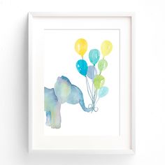 an elephant with balloons in it's trunk hangs from a white frame on the wall