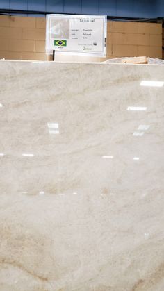 a large white marble slab in a warehouse