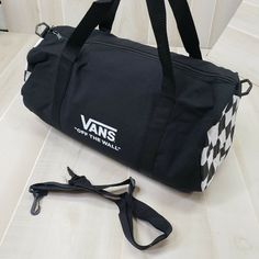 Vans Duffle Bag Vans Family Exclusive Not Sold In Stores Black With White Logo Black/White Checker On Sides Approximately 19" X 10" X 10" Canvas Polyester Lining Carry Handles Adjustable Removable Shoulder Strap Included Brand New In Vans Family Plastic Canvas Gym Bag, Vans Bags, Family Canvas, Vans Black And White, Vans Off The Wall, Logo Black, Black White Fashion, Mens Vans, Duffel Bag