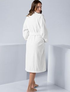 Getting home after a long day of work and tossing on a comfy robe is the best feeling. This Turkish cotton terry bathrobe for women was clearly made with those evenings in mind. It is made from high-quality cotton material that is both soft and cozy to keep you warm at all times. Featuring a tie belt, shawl collar, and pockets, this robe combines style and comfort to bring you a truly satisfying experience. Its versatility as a bathrobe makes it the perfect clothing accessory to wear anytime, an Cozy Relaxed Fit Robe For Lounging, Relaxed Fit Robe For Lounging, Relaxed Fit Solid Color Lounging Robe, Long Sleeve Comfortable Robe For Relaxation, Comfortable Long Sleeve Robe For Relaxation, Comfortable Long Sleeve Relaxation Robe, Relaxed Fit Solid Color Robe For Relaxation, Cozy White Robe For Relaxation, White Cozy Sleep Robe