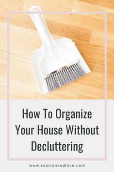 a broom with the words how to organize your house without decluttering