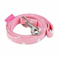 a pink leash with white polka dots on it