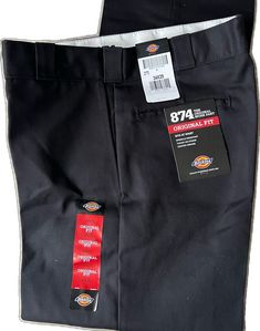 Workwear Pants With Hip Pockets, Black Bottoms With Hip Pockets And Short Leg, Black Cotton Short Leg Pants, Black Work Pants With Hip Pockets, Black Short Length Cargo Pants With Belt Loops, Black Short-length Cargo Pants With Belt Loops, Black Cargo Pants With Belt Loops, Black Cargo Shorts With Belt Loops, Black Tapered Leg Work Pants With Belt Loops