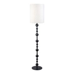 a floor lamp with a white shade on it's base and black beading