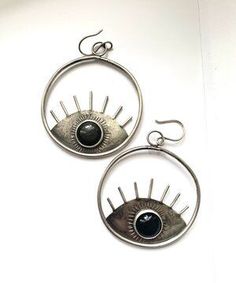 Bohemian Evil Eye Earrings As Gift, Sterling Silver Evil Eye Teardrop Jewelry, Sterling Silver Teardrop Evil Eye Jewelry, Spiritual Evil Eye Dangle Jewelry, Metal Evil Eye Jewelry, Symbolic Evil Eye Jewelry, Black Bohemian Evil Eye Jewelry, Black Bohemian Jewelry With Evil Eye, Symbolic Evil Eye Jewelry For Festival