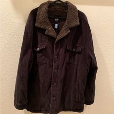 Euc! Men’s Gap Chocolate Brown Corduroy Sherpa Lined Trucker Jacket Jacket Is Like New Only Used Once And Was Stored. Four Front Pockets, Two Inner Pockets, Sherpa And Quilted Lining. Original Y2k Buttons. Size: Xxl Color: Chocolate Brown Approx Measurements: Hth: 35” Ptp: 26" Sleeve: 27” Pet/Smoke Free Home Bundle & Save!!! I Give Discounts On Bundles, As Well As Save You Big On Shipping!! New To Poshmark? Use The Code Ucmesmile When Signing Up To Get $10 Off Your 1st Order!! Happy Poshing Out There! Gap Outerwear For Fall Streetwear, Gap Cotton Outerwear For Streetwear, Gap Fall Streetwear Outerwear, Gap Brown Winter Outerwear, Brown Gap Winter Outerwear, Brown Gap Outerwear For Winter, Gap Outdoor Outerwear With Pockets, Casual Brown Outerwear By Gap, Original Y2k