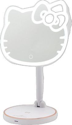 a hello kitty light up mirror on a stand