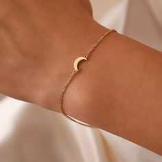 Tiny Moon Bracelet, 14K Real Gold Celestial Bracelet, Dainty Custom Moon Bracelet, Minimalist 14K Gold Moon Bracelet, Summer Jewelry, Gift For Her, Anniversary Bracelet, Birthday Gift, Christmas Gift, Solid Gold Bracelet, Minimalist Gold Bracelet, Wedding Bracelet, Valentine's Day Gift "Material: SOLİD GOLD (No Gold Filled Or No Gold Plated)" "KARAT: 14K (585) "Bracelet Length: 10,2 MM "Bracelet Width: 5,3 MM "Available Gold Color: (Yellow Gold, White Gold, Rose Gold) "The certificate will be se Elegant Moon Charm Bracelet, Elegant Gold Bracelets With Moon Phase, Dainty Moon Shaped Bracelets As Gift, Elegant 14k Gold Filled Moon-shaped Jewelry, Elegant Gold Moon Phase Bracelets, Elegant Adjustable Bracelet With Moon Charm, Elegant Everyday Bracelets With Moon Charm, Elegant Moon Phase Bracelet As A Gift, Elegant Moon Phase Bracelet As Gift