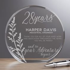 a clear glass award with the words, 25 years harper davis industrial engineer thank you for all your hard work and dedication throughout the years