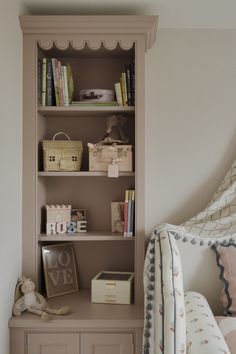 a bookshelf in the corner of a child's room