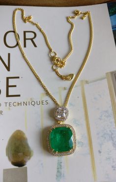 "Classic necklace made using Emerald Doublets cushion shape cut stone and best AAA quality Zircons. Metal used is Silver 925 and is real 18K Gold Filled to enhance the life and look of jewelry. Necklace chain has length adjustment options from 16\" to 18\" inches. We have used Emerald Doublet cushion shape cut which looks exactly like real Colombian Emerald. Doublet is nothing more than a natural stone glued to a cheaper stone. The advantage of creating a doublet over selling a synthetic gemston Luxury Emerald Engagement Necklace For May Birthstone, Luxury Gold Emerald Birthstone Necklace, Luxury Handmade Emerald Necklace With Round Beads, Luxury Yellow Gold Emerald Engagement Necklace, Luxury Round Emerald Necklace With Gemstone Beads, Luxury 22k Gold Temple Jewelry Emerald Necklace, Luxury Cushion Cut Gemstone Necklace, Luxury Cubic Zirconia Cushion Cut Necklace, Luxury Cushion Cut Cubic Zirconia Necklace