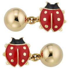 A pair of Cartier ladybird cufflinks, each cufflink with a red and black enamelled ladybird connected with a trace chain to a gold hemisphere, signed Cartier Paris, bearing French 18ct gold marks, circa 1990 , each ladybird measuring 1.2cm in diameter, gross weight 7.1 grams This vintage pair of cufflinks is in very good condition for its age. This charming and lucky pair of Cartier ladybird cufflinks is part of the cufflink collection of Bentley & Skinner, the London distinguished jewellers by appointment to His Majesty the King. Each cufflink, a miniature masterpiece, displays the lucky motif of a red and black enamelled ladybird, delicately linked together with a gold hemisphere. Bearing the prestigious signature of Cartier Paris, these cufflinks exude a tasteful and enchanting embellis Classic Red Enamel Jewelry, Cartier Silver Jewelry For Business, Vintage Cartier Watch, Cartier Gold, Tank Watch, Tsar Nicholas Ii, Mens Fashion Jewelry, Gold Cufflinks, Vintage Cufflinks