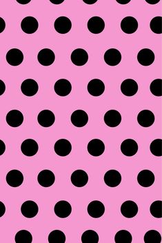 a pink and black polka dot background