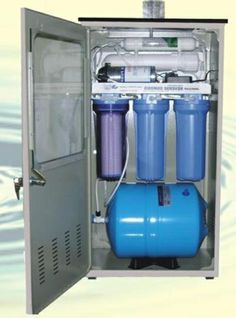 an open water storage unit with two blue tanks