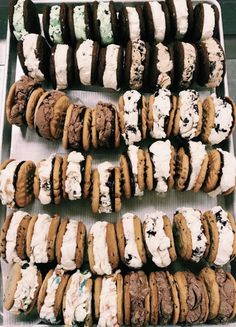 an assortment of cookies and pastries on display