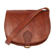 Our handmade leather Saddle Bag is a classic that comes in three sizes to suit your needs. Once used as the accessory seen on hunters, the now fashionable Saddlebag is a vintage lovers dream, a timeless shape that will never go out of style. Like all good things, this trusty saddle bag will get better with age! Features: - Handmade from natural leather - Adjustable shoulder strap - Secure buckle closure - Main compartment with additional slim pocket inside - Additional pocket under the flap. Siz Vintage Lovers, Leather Saddle Bags, Leather Artisan, Bag Light, Vintage Lover, Saddle Bag, Stylish Bag, Black Handbags, Natural Leather