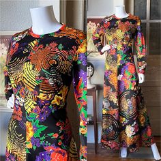 "1960's maxi dress by Brief Originals. Made from an acrylic/nylon blend fabric. Black background with a vibrant botanical print. Spiderwebs? Tree rings?  Whatever they are it's such a spectacular print. Banded scoop neckline, with an inverted basque empire waist and back zipper closure. Excellent condition. No size tag present.  Bust 40\" Waist 34\" Hips 56\" Bodice 14\" Shoulders 16\" Armscye 18\" Arm length 22\" Overall length 58\" Shown on a 5'8\" Mannequin with 33\" Bust- 25\" Waist- 35\" Hi Multicolor Retro Maxi Dress With Floral Print, Retro Multicolor Printed Maxi Dress, Multicolor Vintage Print Maxi Dress, Retro Multicolor Floral Print Maxi Dress, 1970s Fitted Multicolor Maxi Dress, Floral Party Dress, Vintage Nightgown, Printed Maxi, Wide Leg Jumpsuit