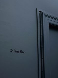 st paul's blue sign on the side of a building