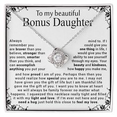 a necklace with the words to my beautiful son's daughter on it and an image of