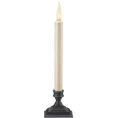 a white candle on a black stand