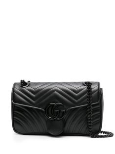 black leather signature Marmont quilting signature Double G logo plaque foldover top with push-lock fastening sliding chain-link shoulder strap main compartment internal zip-fastening pocket internal logo patch full lining This piece comes complete with a protective dust bag. Double G Logo, Quilted Shoulder Bag, Guccio Gucci, G Logo, Planet People, Gucci Gg Marmont, Gg Marmont, Small Shoulder Bag, Ballet Flat Shoes