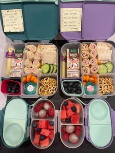 several plastic containers filled with food on top of a table