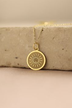 Gold Sun Pendant - Sun Gold Necklace ● Material of pendant: Solid Gold 14k ( REAL GOLD ) ● Metal Stamp: 14k ( REAL GOLD ) ● The pendant is available in 5 sizes: - 12,7 mm / 0.5 inches (Diameter) - 14,0 mm / 0,55 inches ( Diameter ) In the photos - 15,3 mm / 0.6 inches ( Diameter ) - 16,5 mm / 0,65 inches ( Diameter ) - 19,1 mm / 0,75 inches ( Diameter ) ( In the photos the size is 14mm / 0.55 inches Diameter ) ( Jump Ring inner diameter: 4 mm ) ● Material of chain: Solid gold 14k ( REAL GOLD ) I Spiritual 14k Gold-filled Yellow Gold Charm Necklace, Spiritual 14k Gold Filled Yellow Gold Charm Necklaces, Yellow Gold Plated Charm Necklace As Gift For Her, Yellow Gold Plated Charm Necklace For Her, Gold Plated Yellow Gold Charm Necklace For Her, 14k Gold Filled Yellow Gold Charm Necklace For Anniversary, Spiritual Yellow Gold Necklace As Gift For Her, 14k Gold Filled Spiritual Necklaces, Tarnish Resistant Yellow Gold Charm Necklace For Her