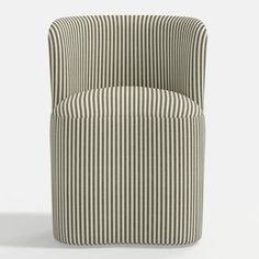 a striped chair sitting on top of a white floor