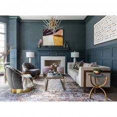 a living room with blue walls and furniture