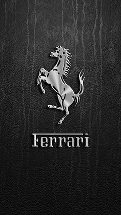 the ferrari logo is shown on a black leather background with silver lettering and an image of a horse