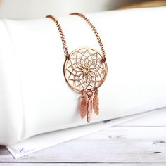 Elegant Handmade Dream Catcher Necklace - Sterling Silver and Gold Plated Pendant - Unique Rose Gold Charm for Women - Ideal Gift for Her, Artisan Crafted Jewelry Discover the enchanting beauty of our Handcrafted Dream Catcher Necklace. Each piece, meticulously crafted in Sterling Silver and adorned with Gold Plating, embodies elegance and spirituality. The Rose Gold Pendant, a symbol of luck and protection, makes this necklace not just a piece of jewelry but a meaningful talisman. It's more than an accessory; it's a personal statement, a celebration of artistry and a connection to ancient traditions. Perfect for any occasion, this necklace is a thoughtful gift that resonates with love, care, and positive energy. Embrace its charm and make your everyday special. K EY ∙ F E A T U R E S 🌟 P Handmade Dream Catcher, Dreamcatcher Pendant, Luck Necklace, Dream Catcher Necklace, Handmade Dreamcatcher, Unique Roses, Rose Gold Pendant, Classic Gold, Crafted Jewelry