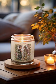 a candle sitting on top of a wooden table