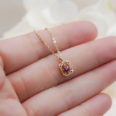 Tiny vintage style natural red ruby charm pendant made with 18K gold. The chain is not included and can be purchased from our shop. * Metal: 18K Yellow Gold * Stone info: natural ruby * Stone size: 3mm approx. * Stone carat weight: 0.17ct approx. * Bail size: 3x1.5mm approx. * Pendant size: 7.5x6mm approx. * Stamp: AU750(18K) * Guaranteed Authentic Solid Gold, Not Plated or Filled ❤️Visit our official website for exclusive new products. https://elekalonjewelry.com/ ❤️Follow us on Instagram @ elekalonjewelry for the latest projects and much more! ❤️If you have any questions, please feel free to message us. Ruby Birthstone Necklaces, Dainty Gold Ruby Jewelry, Gold Jewelry With Lab-created Ruby As A Gift, Gold Jewelry With Lab-created Ruby For Gift, Yellow Gold Jewelry With Lab-created Ruby For Gift, Ruby Necklace In Yellow Gold As A Gift, Oval Lab-created Ruby Gold Jewelry, Yellow Gold Ruby Necklace As Gift, Oval Gold Jewelry With Lab-created Ruby