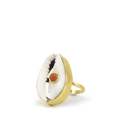 A reminder that sunny days are on the horizon, this stunning ring is carefully handmade from 18k gold over sterling silver wrapping a white cowrie shell marked with a pretty coral bead. Style it with similar styles from the Marina collection. Presented in a Vintouch signature packaging. Handmade from 18-karat Yellow Gold Over Sterling Silver (1-micron plating).   We suggest to avoid contacts with soaps, detergents, chlorine and any other chemical substance that could alter the original character Packaging Handmade, Blue Topaz Bracelet, Closet Door, Shell Ring, Italian Jewelry, Summer Earring, On The Horizon, Original Character, Cowrie Shell