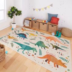 a child's room with dinosaur rugs and toy bins on the floor