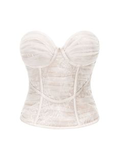 Step out into the season in style with a classic bustier top. The Cara Top features a simple tube top design with textured fabric. The outer layer is pleated mesh, which vaguely exposes the lace pattern underneath. It's sexy, sleek, and oh-so darling. Bustier top Open zipper in back Chest pads included Fish bone fastening Dry clean only Luxury White Underbust Bodice, Luxury White Lace Bodice Top, Tube Top Design, Nana Jacqueline, Girls Stuff, Fame Dr, Fish Bone, Bustier Top, Top Design