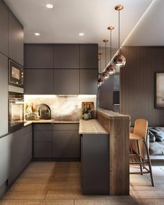 a modern kitchen with wooden cabinets and marble counter tops