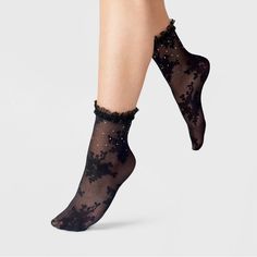 Add elegant style to your everyday looks with the Jewel Floral Sheer Anklet Socks With Ruffle from A New Day™. These black socks feature a sheer construction with floral knit detailing for a textured appeal. Adorned with rhinestones, these anklet socks showcase ruffled trim and banded cuffs for an eye-catching look. Plus, they're made from soft and stretchy fabric for comfortable wear. A New Day™: Style that goes wherever you do. Elegant Black Socks For Spring, Black Ruffle Socks, Fashion Outfits Simple, Black Anklet, Tulle Socks, Retro Inspired Fashion, Outfits Simple, Edgy Looks, College Essentials